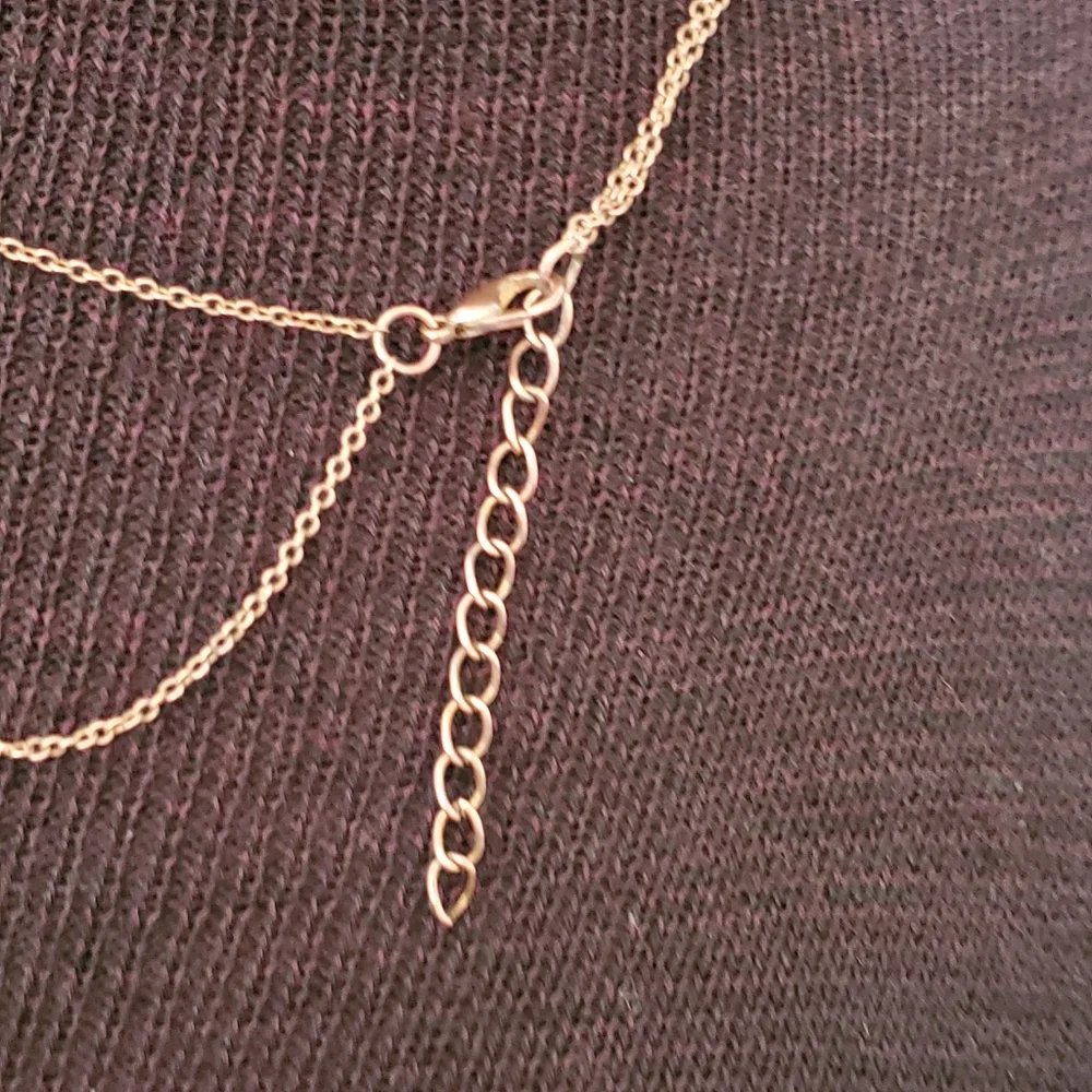 Copper tone two strand necklace with salmon colored marble look stone